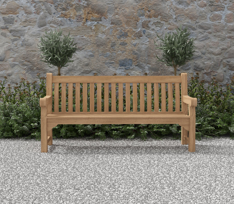 Teak bench in a garden setting