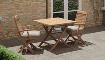 Teak Square Folding Table with Lincoln Folding Carver Chairs & Ecru Cushions Front Angled View