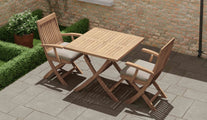 Teak Square Folding Table with Ripon Folding Carver Chairs & Ecru Cushions Overhead Perspective