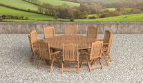 Teak Fixed Round Table with Lymington Recliner Chairs Front View