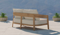 Windsor Teak Two Seater Sofa with Ecru Cushions Rear Angled View