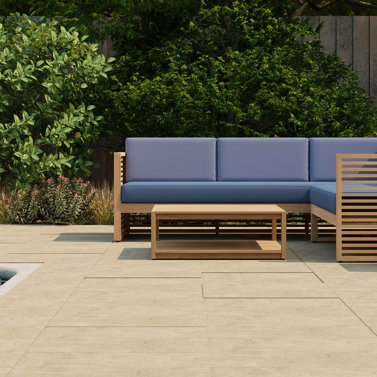 Buckingham Teak Outdoor Modular Furniture Showing Close Up of L Shaped Sofa with Square Coffee Table in Paris Fabric - Navy Seat Cushions & Cornflower Back Cushions