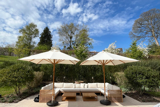 <p> <a href="/collections/the-buckingham-teak-collection" target="_blank" title="The Buckingham Teak Collection">Buckingham Modular Sofa </a>with <a href="/collections/parasols" target="_blank" title="Parasols">Parasols</a></p>