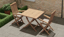 Teak Square Folding Table with Lincoln Folding Carver Chairs with Ecru Cushions Overhead Perspective