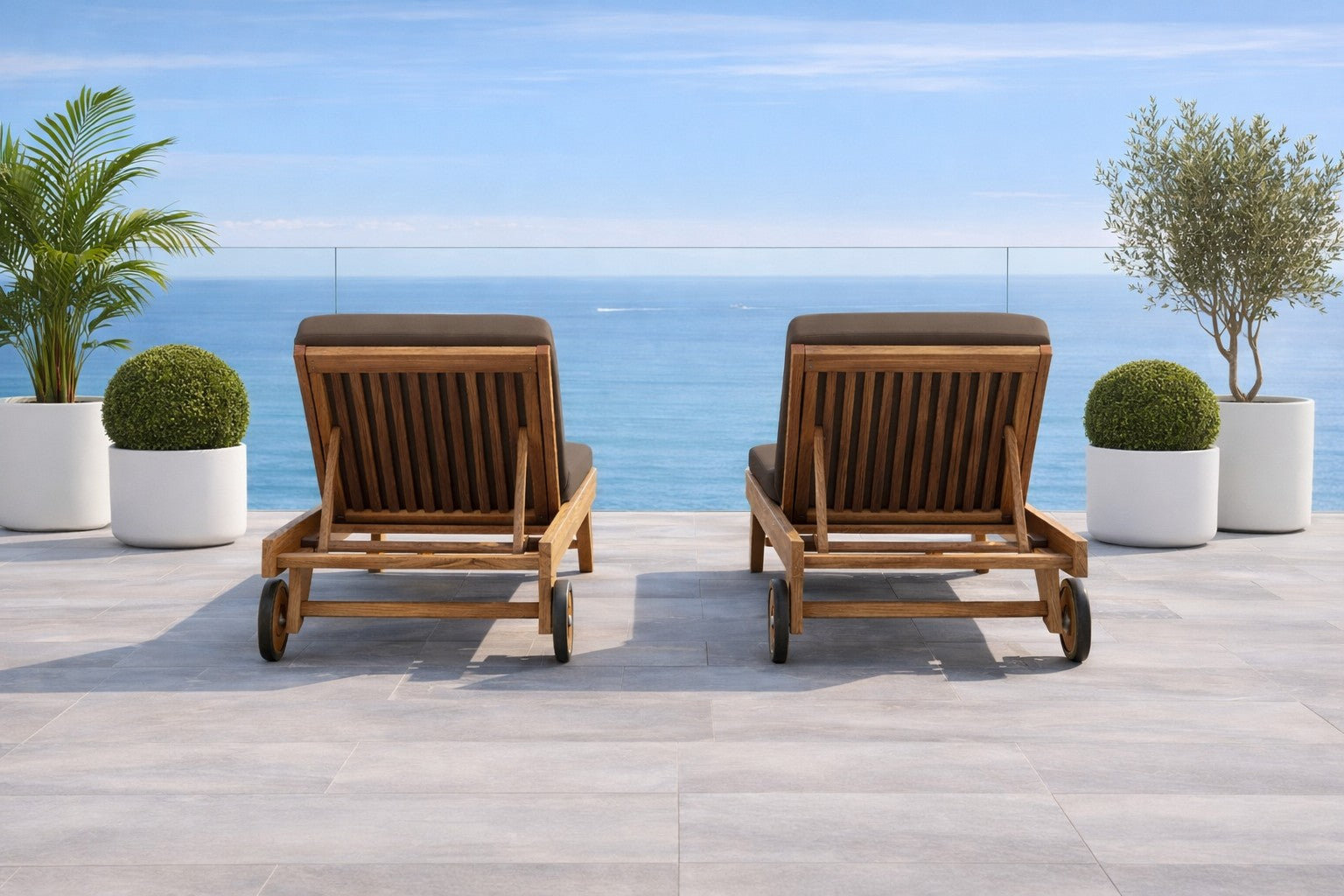Teak Sunlounger looking out to sea