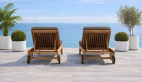 Teak Sunlounger looking out to sea