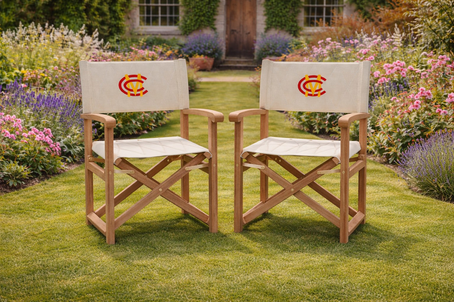 Two MCC Teak Directors Chairs In The Garden