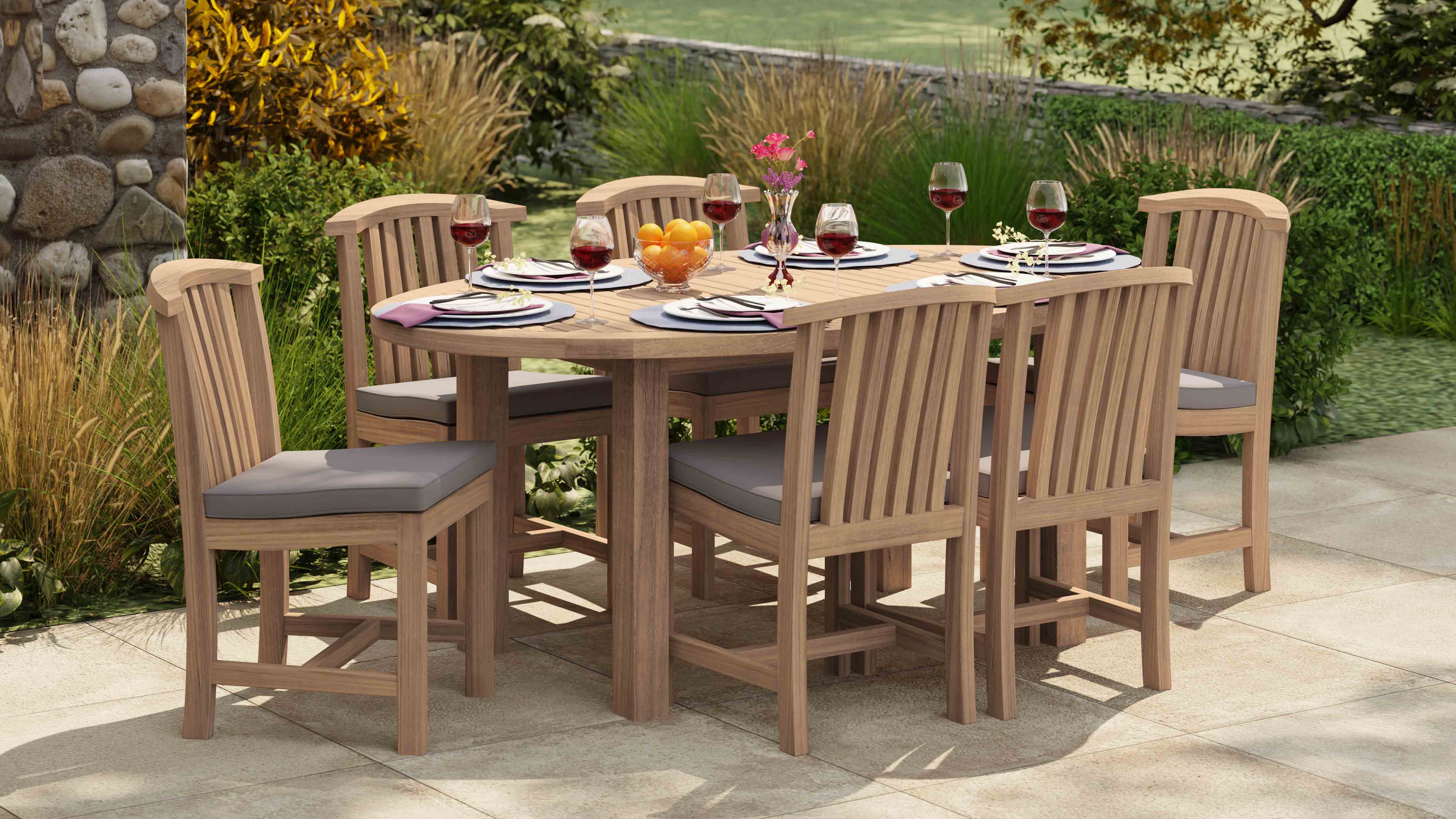 Fixed Teak Oval Garden Dining Table & 6 Winchester Dining Chairs Front Angled View Fully Dressed With Light Grey Cushions