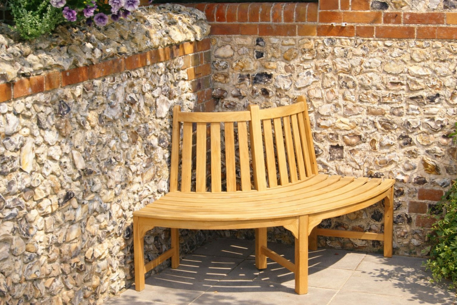 Quarter Circle Corner Bench On A Sunny Patio