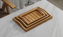 A Set of 3 Teak Trays with Arched Handle