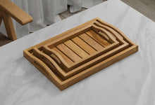A Set of 3 Teak Trays with Arched Handle