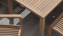 Fixed Rectangular Teak Garden Dining Table with Guildford Carver & Dining Chair in Detail