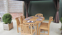 Teak oval garden dining table & chair set